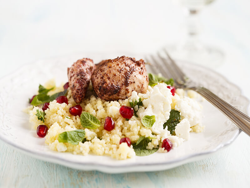 Pomegranate chicken with almond couscous
